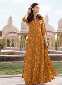 Viva N Diva Mustard Colored Heavy Rayon Printed Kurti.