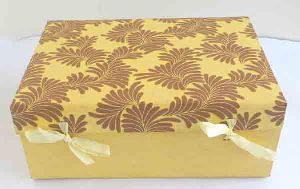 Yellow printed cotton paper with ribbons closure boxes