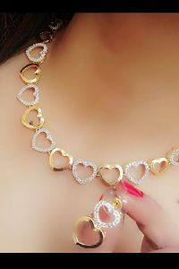 Ankur brillant gold and rhodium plated american diamond heart shape necklace set for women
