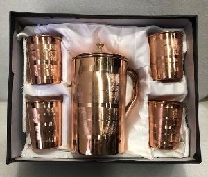 Copper Jugs and Four Glass Set