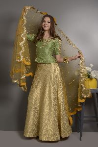 GREEN RAW SILK HEAVY HAND EMBROIDED LONG CROP TOP WITH BROCADE LEHENGAAND ORGANZA DUPPATTA