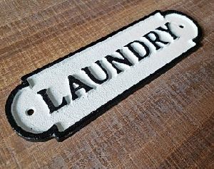 Cast Iron laundry room sign