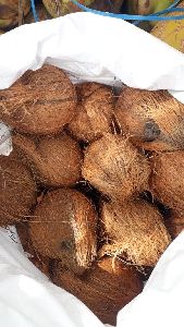 de husked coconuts
