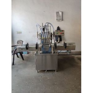 4 head volumetric automatic liquid filling machine