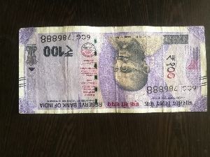100 inr 786 serial number currency note