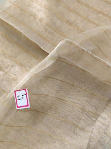 Pure Gold Tissue Silk With Gold Zari Staple Weaved Dyeable Fabric