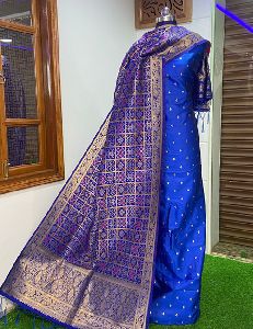 Unstitched Banarasi Silk Patola dupatta with motifs weaved Silk kameez suit set.