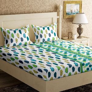 double bed green bedsheet