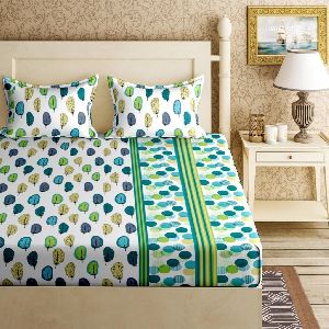 double bed green bedsheet