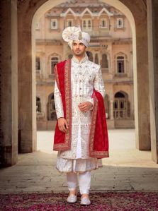 MIRROR TOUCH WHITE SHERWANI WITH WHITE PRINTED ANARKALI KURT