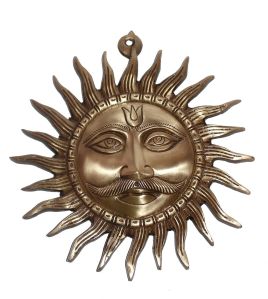 brass sun face statue