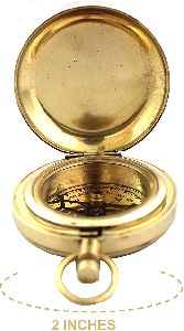 brass compass with cap