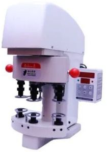 Automatic Button Attaching Machine