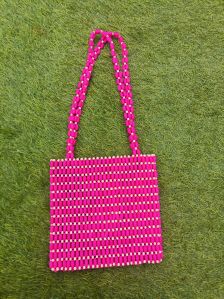 pink beaded bag