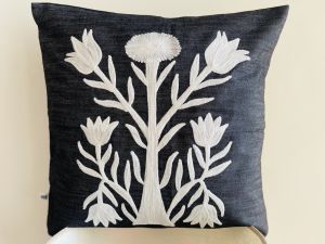 Embroidered knotted cushion cover