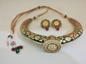 Tanjore necklaces in 24 ct gold foil