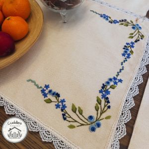 hand-embroidered blue bullion rose table mat