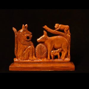 Depicting Cow and a Lion Wooden Art