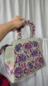 Leather bag with hand embroidery