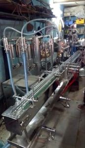 4 Head Volumetric Liquid Filling Machine