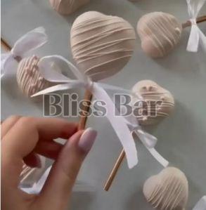 Chocolate Heart Lollipop, Color : White, Taste : Sweet For Bakery