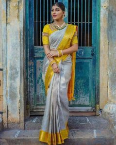 Women Yellow Color Lichi Silk Woven Traditional Saree