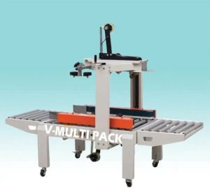 Box Tapping Machine, Voltage : 220V, Weight : 50-100 Kg