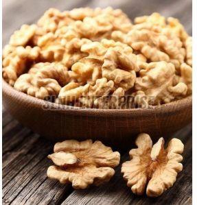 Natural Dry Split Walnuts, Color : Brown, Taste : Light Sweet