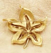 gold designer brooch pins