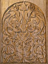 carved wooden door panel