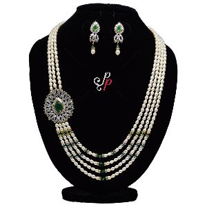 Designer Pearl Necklace in Shiny White Oval Pearls and Emerald Pendant