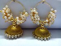 Grand  Jhumka In Dual Colour Of Dark Maroon With Gold