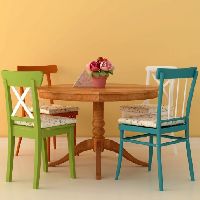 Round Dining Table with Colorful Chairs