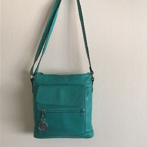 Ladies Leather Turquoise Sling Bags