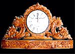 Hand carved wall clock