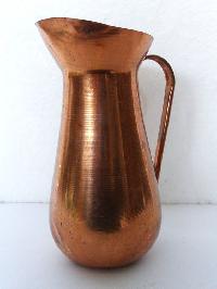 handcrafted brass metal jug