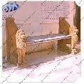 beige sandstone lion status bench