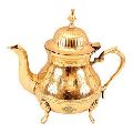 serving brass tea pot