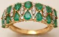 Connected Pear Emerald half gold band