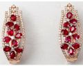 diamond studded pear ruby earrings