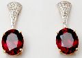 Glass Filled Red Oval Cut Ruby Earrings
