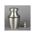Brass cremation urn with pewter finish