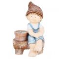 Boy sitting on Bench Pot, planter