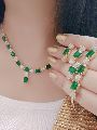 Ankur women designer gold plated green american diamond combo necklace set