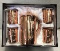 Copper Jugs and Four Glass Set