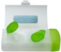 Plastic. Green and White contact lens case