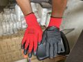 black crinkle latex coated red poly glove