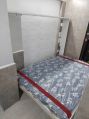 Vertical wall bed