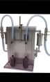 Semi automatic 2 Head volumetric filling machine