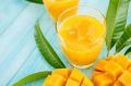 Golden Yellow or Orange mango juice